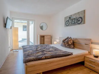 Ein Bett oder Betten in einem Zimmer der Unterkunft Apartment Konrad by Interhome