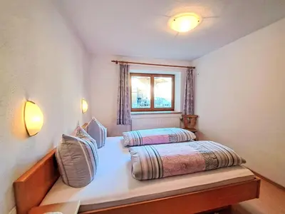 Ein Bett oder Betten in einem Zimmer der Unterkunft Apartment Weißbacher by Interhome