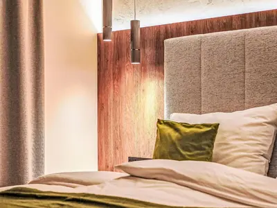 Ein Bett oder Betten in einem Zimmer der Unterkunft Apartment Aparthotel Iris-1 by Interhome