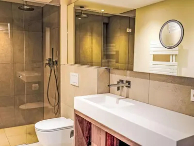 Ein Badezimmer in der Unterkunft Apartment Aparthotel Iris-1 by Interhome
