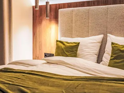 Ein Bett oder Betten in einem Zimmer der Unterkunft Apartment Aparthotel Iris-2 by Interhome