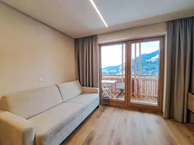 Ein Sitzbereich in der Unterkunft Apartment Aparthotel Iris-6 by Interhome