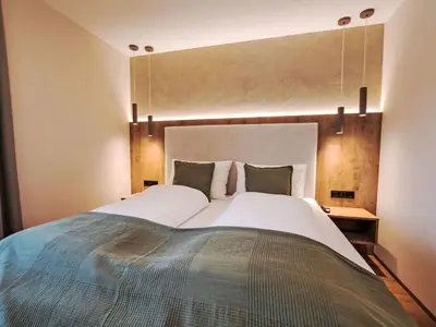 Ein Bett oder Betten in einem Zimmer der Unterkunft Apartment Aparthotel Iris-6 by Interhome