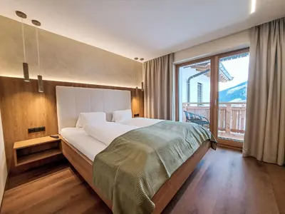 Ein Bett oder Betten in einem Zimmer der Unterkunft Apartment Aparthotel Iris-6 by Interhome