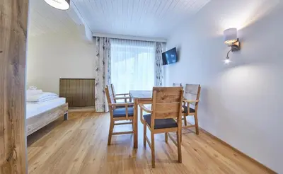 Ein Bett oder Betten in einem Zimmer der Unterkunft Appartement Haus Alexander, JOKERCARD INCLUDED