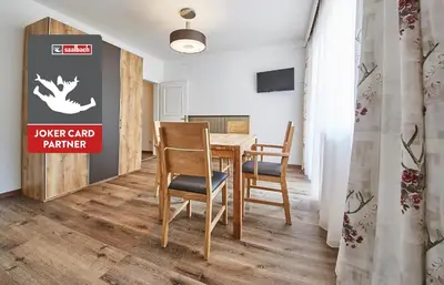 Ein Sitzbereich in der Unterkunft Appartement Haus Alexander, JOKERCARD INCLUDED