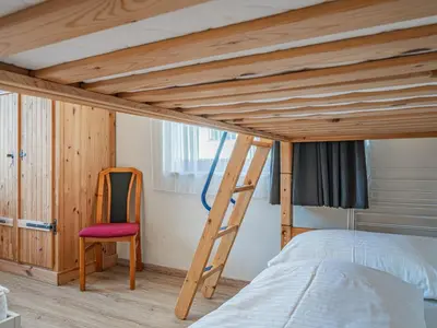 Ein Bett oder Betten in einem Zimmer der Unterkunft Hohe Tauern-Großvenediger