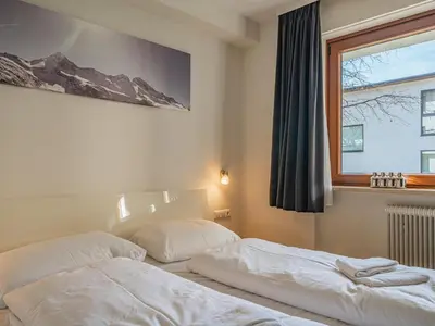 Ein Bett oder Betten in einem Zimmer der Unterkunft Großvenediger