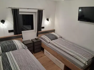 Ein Bett oder Betten in einem Zimmer der Unterkunft Zillerlehen