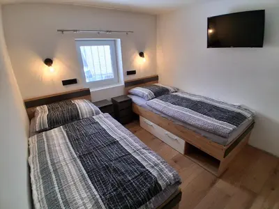 Ein Bett oder Betten in einem Zimmer der Unterkunft Zillerlehen