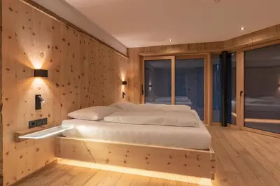 Ein Bett oder Betten in einem Zimmer der Unterkunft Chalet Residenz Mühlermoos - Chalet Bergkulisse