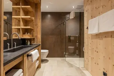 Ein Badezimmer in der Unterkunft Chalet Residenz Mühlermoos - Chalet Bergkulisse