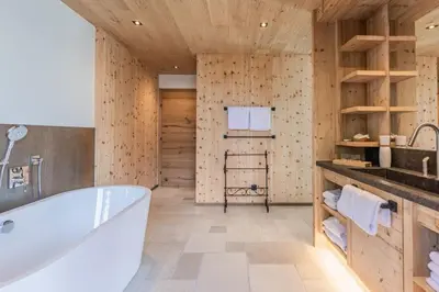 Ein Badezimmer in der Unterkunft Chalet Residenz Mühlermoos - Chalet Bergkulisse