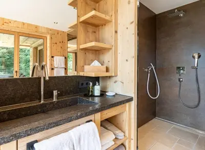 Ein Badezimmer in der Unterkunft Chalet Residenz Mühlermoos - Romantik Chalet