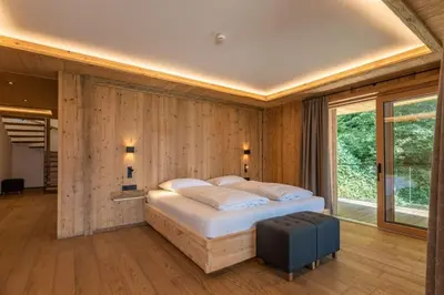 Ein Bett oder Betten in einem Zimmer der Unterkunft Chalet Residenz Mühlermoos - Romantik Chalet