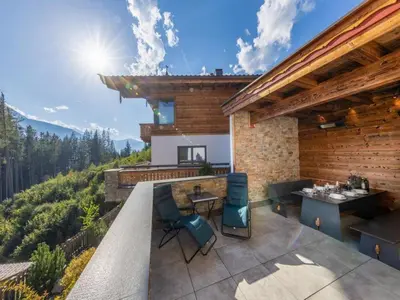 Ein Balkon oder eine Terrasse in der Unterkunft Neukirchen Chalet with Sauna, Balcony