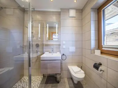 Ein Badezimmer in der Unterkunft Family stay in Neukirchen with sauna