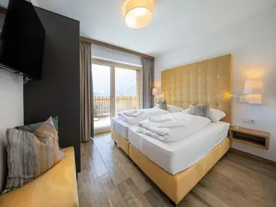 Ein Bett oder Betten in einem Zimmer der Unterkunft Chalet with Ski Access, Neukirchen