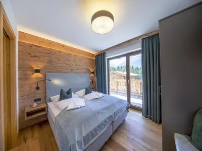 Ein Bett oder Betten in einem Zimmer der Unterkunft Chalet with sauna, Neukirchen