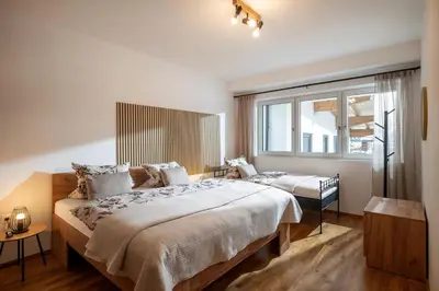 Ein Bett oder Betten in einem Zimmer der Unterkunft Ferienwohnung Valentina