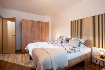 Ein Bett oder Betten in einem Zimmer der Unterkunft Ferienwohnung Valentina