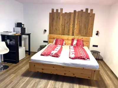 Ein Bett oder Betten in einem Zimmer der Unterkunft ZILLERTAL Suite