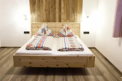 Ein Bett oder Betten in einem Zimmer der Unterkunft ZILLERTAL Suite