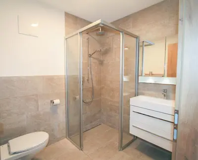 Ein Badezimmer in der Unterkunft Apartment Georg
