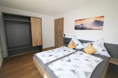 Ein Bett oder Betten in einem Zimmer der Unterkunft Apartment Georg
