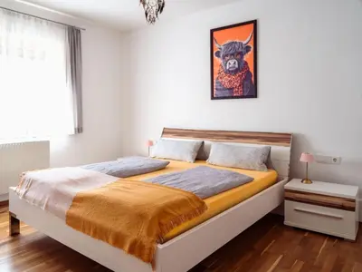 Ein Bett oder Betten in einem Zimmer der Unterkunft Apartment Kunterbunt by Interhome