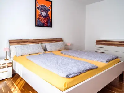 Ein Bett oder Betten in einem Zimmer der Unterkunft Apartment Kunterbunt by Interhome