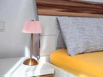 Ein Bett oder Betten in einem Zimmer der Unterkunft Apartment Kunterbunt by Interhome