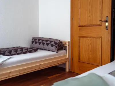 Ein Bett oder Betten in einem Zimmer der Unterkunft Apartment Kunterbunt by Interhome