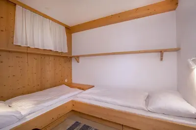 Ein Bett oder Betten in einem Zimmer der Unterkunft Wiesberger 62 Top 11