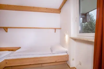 Ein Bett oder Betten in einem Zimmer der Unterkunft Wiesberger 62 Top 11