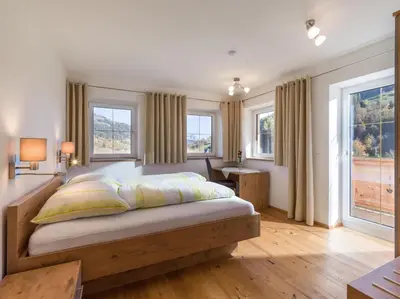 Ein Bett oder Betten in einem Zimmer der Unterkunft Mauerhof Ferienwohnungen am Bauernhof