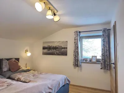 Ein Bett oder Betten in einem Zimmer der Unterkunft Apartment Mühlbach