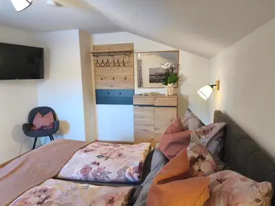 Ein Bett oder Betten in einem Zimmer der Unterkunft Apartment Mühlbach