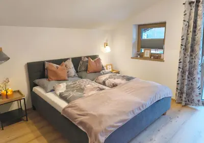 Ein Bett oder Betten in einem Zimmer der Unterkunft Apartment Mühlbach