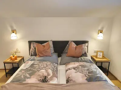 Ein Bett oder Betten in einem Zimmer der Unterkunft Apartment Mühlbach