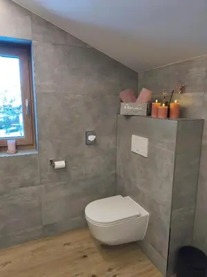 Ein Badezimmer in der Unterkunft Apartment Mühlbach