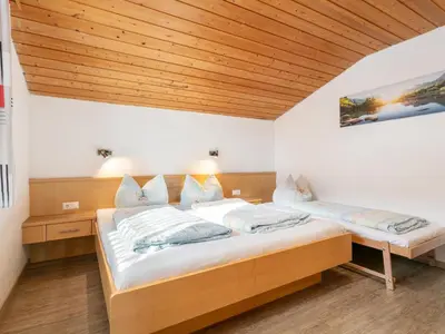 Ein Bett oder Betten in einem Zimmer der Unterkunft Haus Barbara
