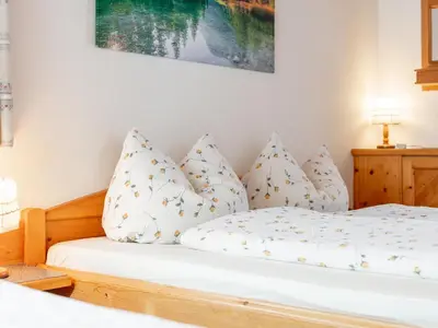 Ein Bett oder Betten in einem Zimmer der Unterkunft Haus Barbara