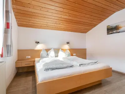 Ein Bett oder Betten in einem Zimmer der Unterkunft Haus Barbara