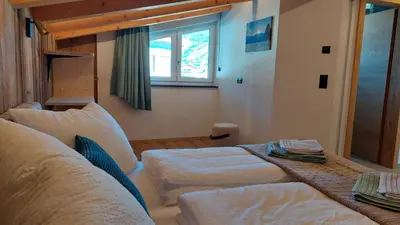Ein Bett oder Betten in einem Zimmer der Unterkunft Apart M&M Michael und Maria