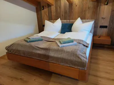 Ein Bett oder Betten in einem Zimmer der Unterkunft Apart M&M Michael und Maria