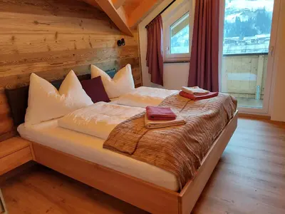Ein Bett oder Betten in einem Zimmer der Unterkunft Apart M&M Michael und Maria