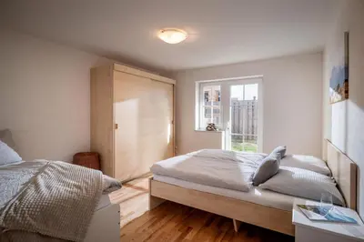 Ein Bett oder Betten in einem Zimmer der Unterkunft Slope Apartment Westendorf