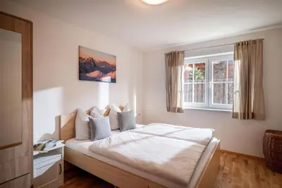 Ein Bett oder Betten in einem Zimmer der Unterkunft Slope Apartment Westendorf
