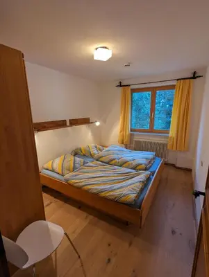 Ein Bett oder Betten in einem Zimmer der Unterkunft Ferienhaus Lengau
